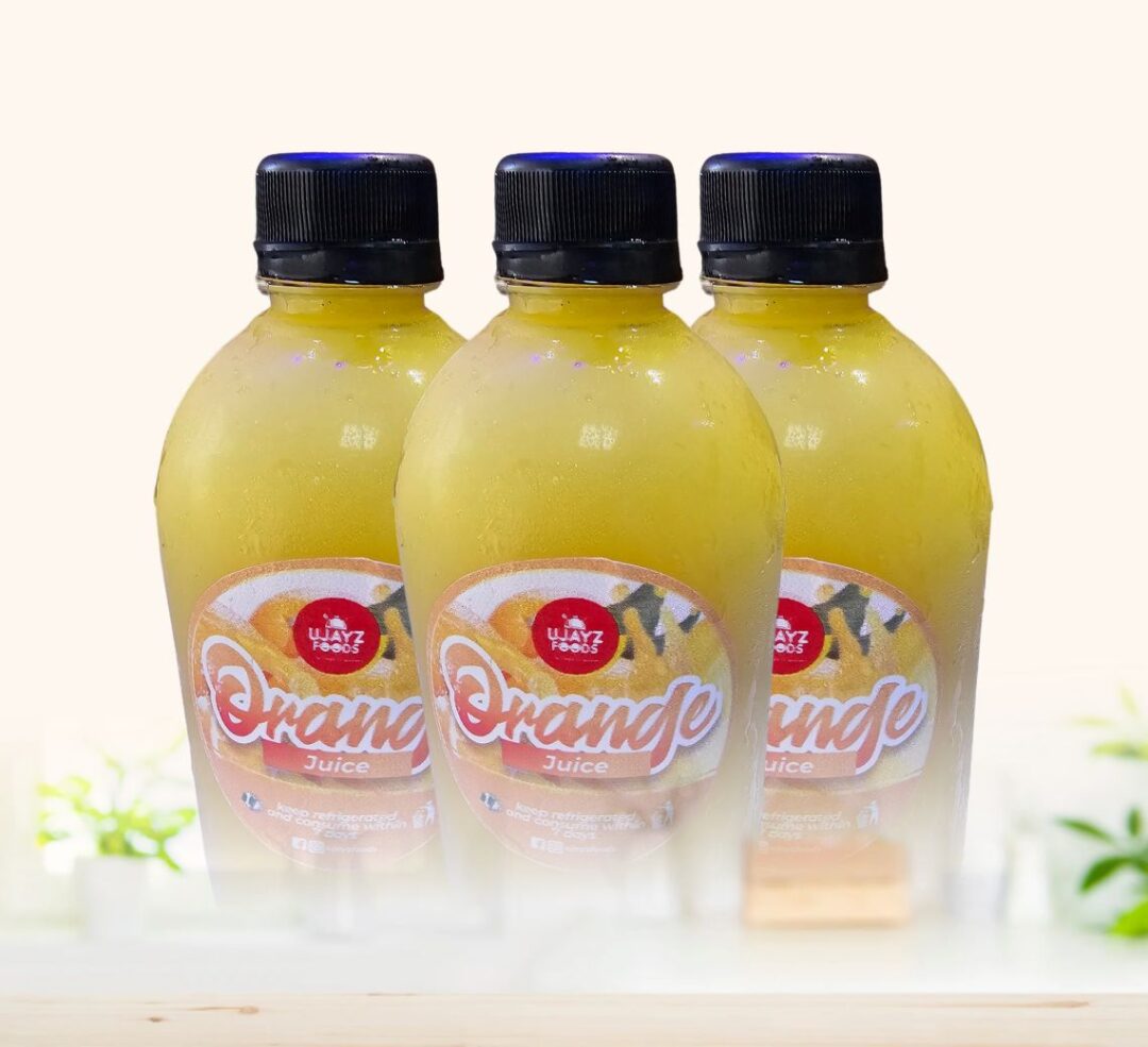 Bottle of fresh orange juice from Ujayzfood with vitamin C made in Asaba