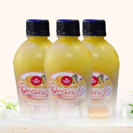 Bottle of fresh orange juice from Ujayzfood with vitamin C made in Asaba